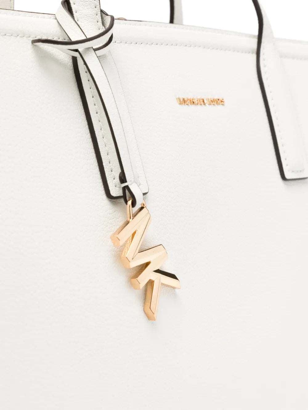 Michael Korstop handles tote bags