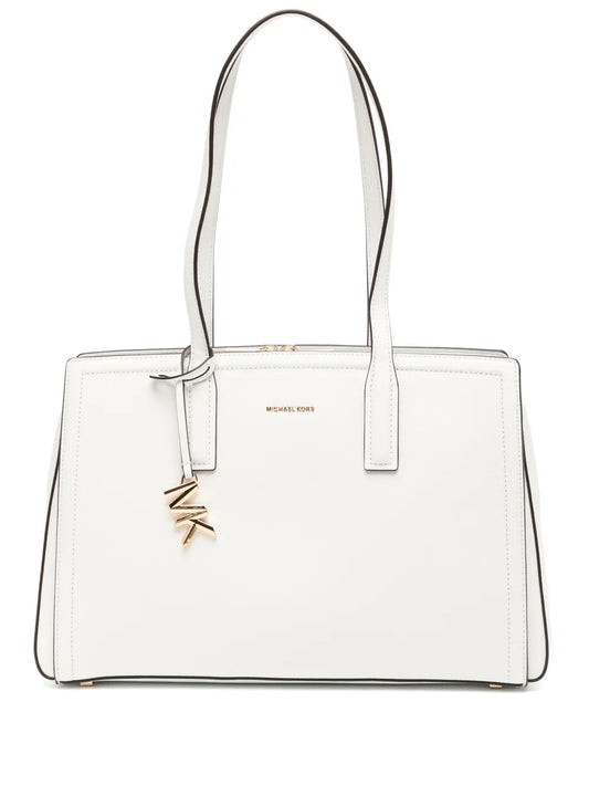 Michael Korstop handles tote bags
